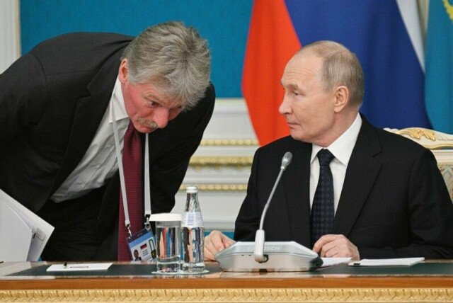 Kreml-talsperson Dmitrij Peskov og Russlands president Vladimir Putin.