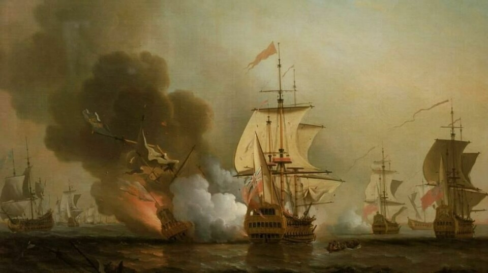 Slik så angrepet på San José ut, ifølge den engelske maleren Samuel Scott (1702-1772). Maleriet viser det britiske fartøyet i sentrum og San José til venstre, som nettopp har detonert. (Foto: Wikimedia commons / public domain).