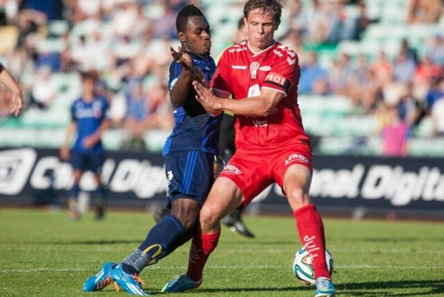 Branns Erlend Hanstveit sperrer for Stabæks Franck Boli på Nadderud i 2014. I dag er han politiker for Arbeiderpartiet.