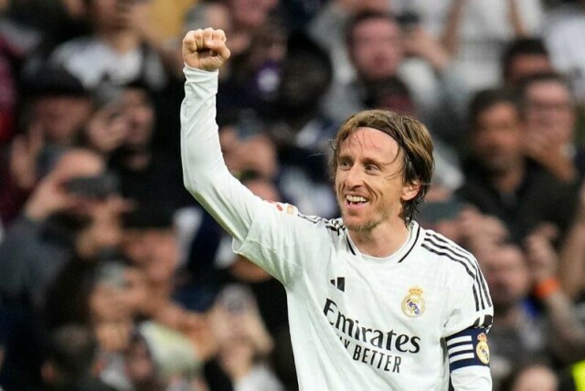Real Madrid-profil Luka Modric blir medeier i Swansea.