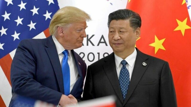 President Donald Trump, left, shakes hands with Chinese President Xi Jinping during a meeting on the sidelines of the G-20 summit in Osaka, Japan, Saturday, June 29, 2019. (AP Photo/Susan Walsh)