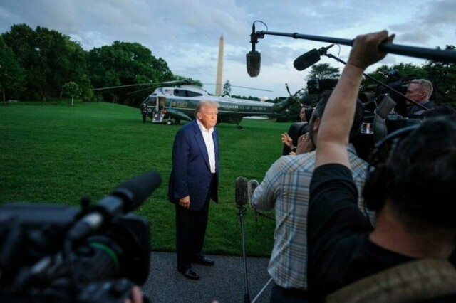 President Donald Trump snakket med journalister da han kom tilbake til Det hvite hus søndag kveld.