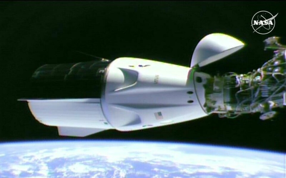 SpaceX-romkapselen Dragon, avbildet under et tidligere besøk til romstasjonen.
