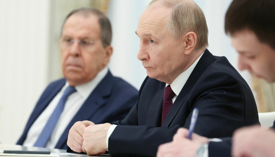Russlands president Vladimir Putin og utenriksminister Sergej Lavrov fotografert i Kreml 23. juni 2025.