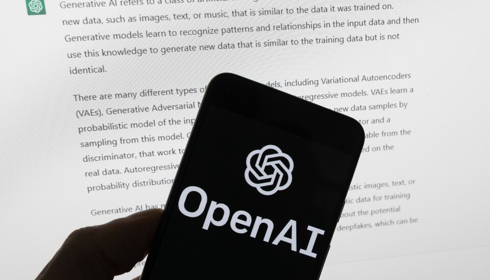 FILE - The OpenAI logo is seen on a mobile phone in front of a computer screen displaying output from ChatGPT, March 21, 2023, in Boston. (AP Photo/Michael Dwyer, File)