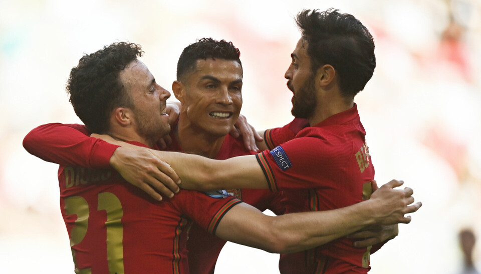 Cristiano Ronaldo (i midten), Diogo Jota (t.v.) og Bernardo Silva i EM for fire år siden.