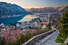 Kotor, Montenegro – Utsikt fra festningsmuren mot byen og bukta, med Church of Our Lady of Remedy i forgrunnen.