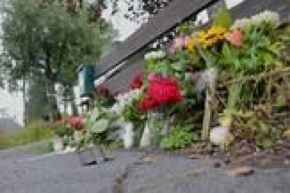 Blomster ligger utenfor hjemmet til den drepte kvinnen i Bærum. Foto: Ørn E. Borgen / NTB scanpix Blomster ligger utenfor hjemmet til den drepte kvinnen i Bærum. Foto: Ørn E. Borgen / NTB scanpix
