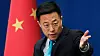 Talsperson for Kinas utenriksdepartement Zhao Lijian kaller etterforskningen ren manipulasjon. Foto: Andy Wong / AP/NTB
