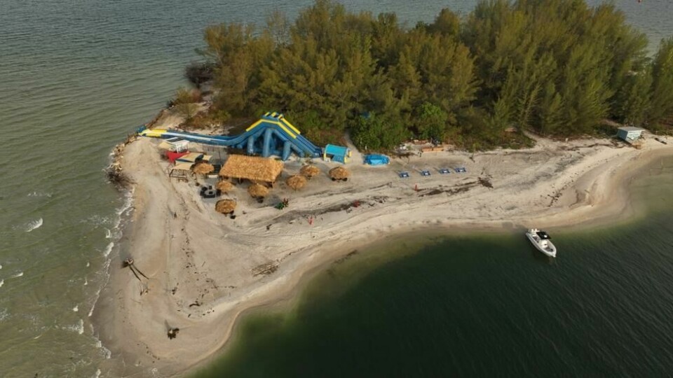 'Ølboksøya' Pine Key har i tiår vært populært utfartssted for partyglade folk i Tampa Bay-området. 'Ølboksøya' Pine Key har i tiår vært populært utfartssted for partyglade folk i Tampa Bay-området. Foto: Judge PR News
