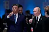 Russlands president Vladimir Putin og Kinas president Xi Jinping på en mottakelse under Brics-toppmøtet i Kazan i Russland 23. oktober. Foto: Aleksander Zemlianitsjenko / AP / NTB