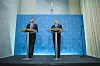 Tore O. Sandvik og Jan Christian Vestre på podier under pressekonferanse om beredskap i Oslo.