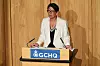 Anne Keast-Butler står ved et GCHQ-podium og holder en tale i Bletchley.