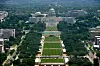 Luftfoto av USAs Capitol og National Mall med grønt anlegg og arrangementrigg i Washington.