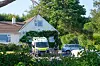 Police outside the house of former lawmaker Ann Widdecombe, in Haytor, England, Friday July 10, 2026, after she was found dead in her home on Thursday with serious injuries. (Matt Keeble/PA via AP)