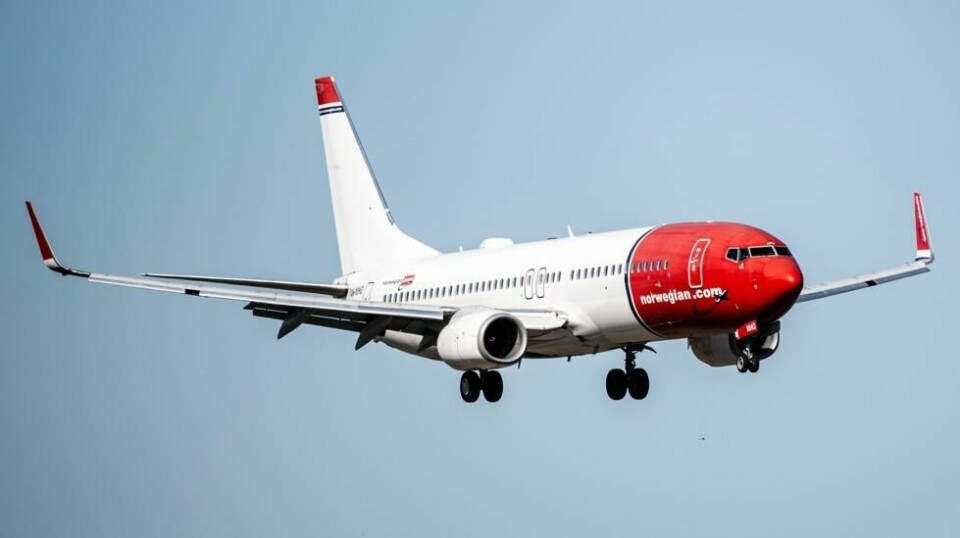 Et fly fra flyselskapet Norwegian fotografert over Oslo lufthavn. Foto: Annika Byrde / NTB