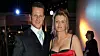 Formel 1-legenden Michael Schumacher og kona Corinna under en prisutdeling i 2005.