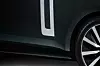 Det spesielle feltet bak forskjermen identifiserer bilen som en Range Rover.