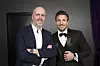 Ole Eikeland og Kjell-Ola Kleiven i dress på TV3s 30-årsjubileum i Oslo.