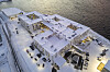 Luftfoto av snødekte Finnmarkssykehuset i Hammerfest ved åpning i 2025.