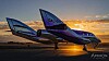 Fly med teksten «GALACTIC» på rullebane i solnedgang.