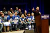 Abdul El-Sayed taler ved talerstol foran støttespillere med «Michigan First»-skilt.