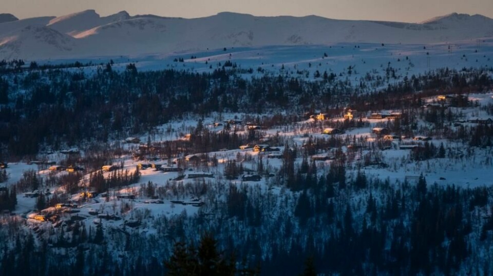 Hyttefelt på Vaset fjellet i Valdres med Jotunheimen i bakgrunnen.