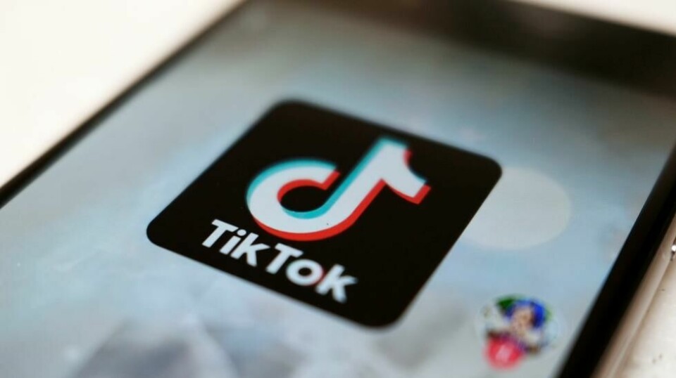 TikTok-logoen vises på en smarttelefon. Illustrasjonsfoto.