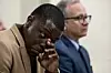 Waffle House-kunden James Shaw Jr. reagerer under pressekonferansen om drapene. Scanpix/EPA.