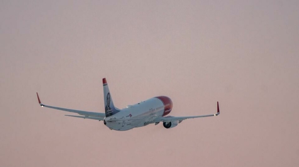 Illustrasjonsfoto. Et Norwegian-fly. Økt oljepris vil føre til høyere pris på flybilletter mener flyanalytiker.