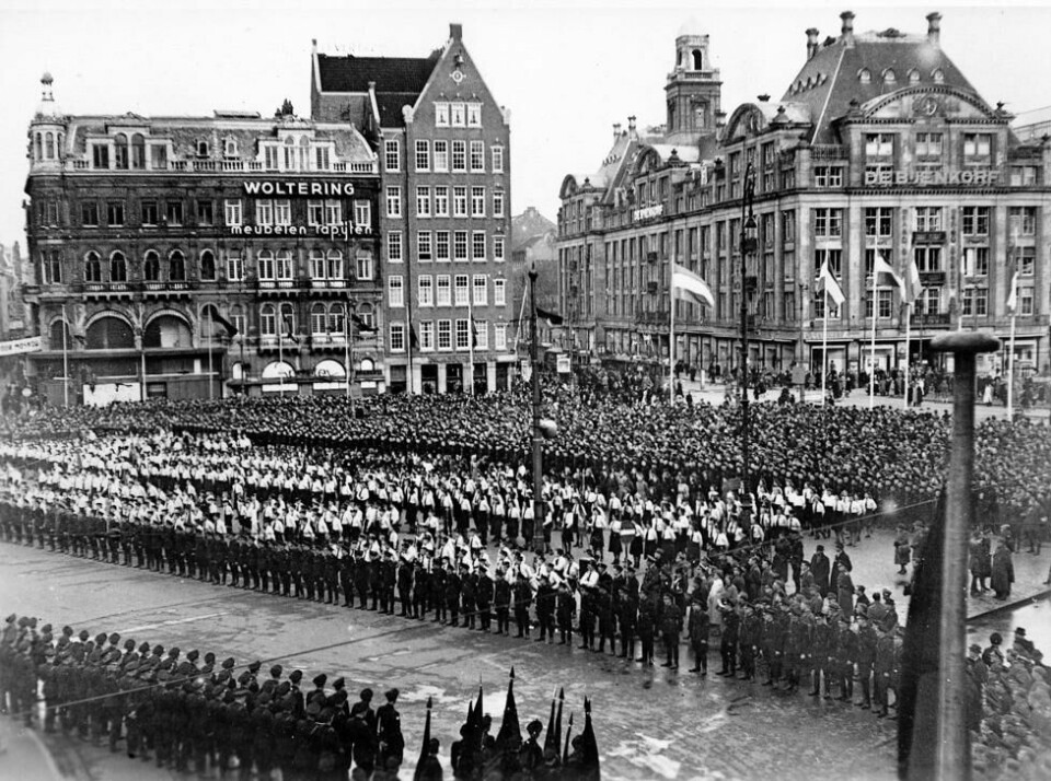 Nazi-demonstrasjon mot bolsjevisme i Amsterdam under andre verdenskrig. Nazi-demonstrasjon mot bolsjevisme i Amsterdam under andre verdenskrig. Foto: NTB