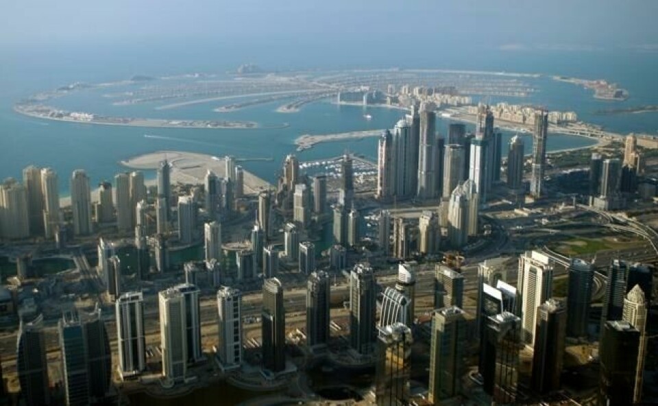 Palm Island i Dubai er her fotografert fra et fly. Palm Island i Dubai er her fotografert fra et fly. Foto: Kamran Jebreili / AP / NTB scanpix