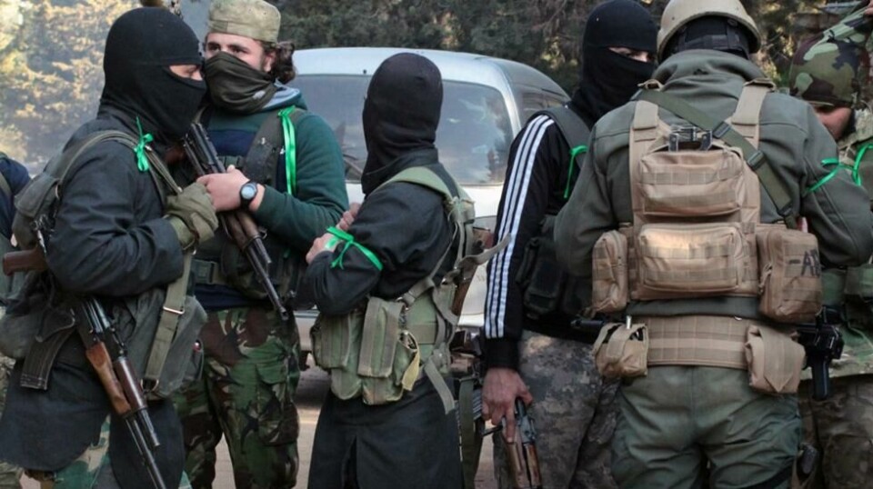 Bildet skal vise krigere fra Hay'at Tahrir al-Sham, eller «Levantens frigjøringskomité» i Idlib-provinsen. Bildet ble offentliggjort av det al-Qaida-vennlige «nyhetsbyrået» Ibaa News 24. februar 2018, men stemmer overens med uavhengige rapporter fra nyhetsbyrået AP. Scanpix/AP.