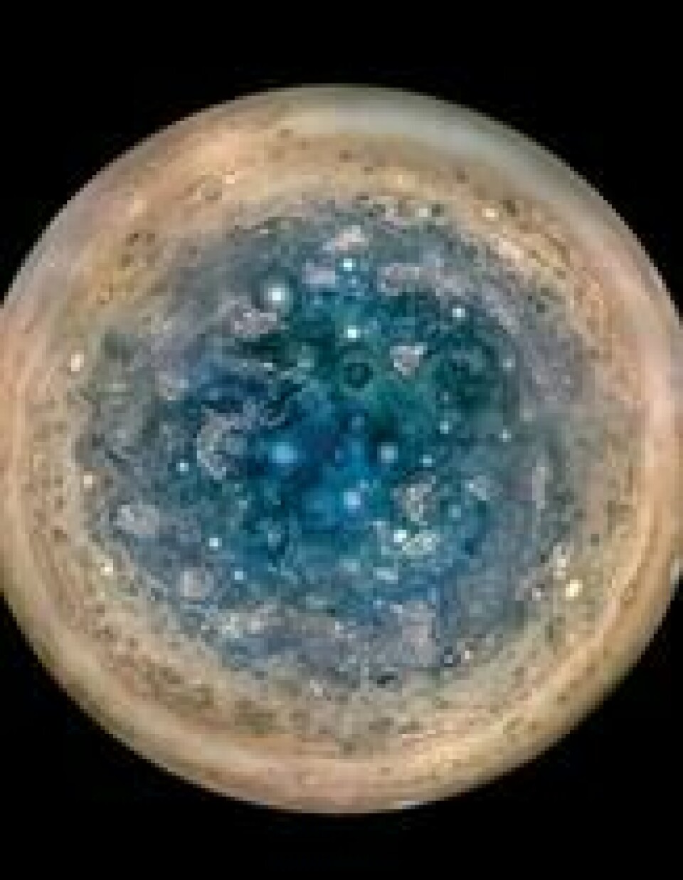 Jupiters sørpol sett fra en høyde på 52.000 km. De ovale formene er sykloner, opp til 1000 km i diameter. Foto: Nasa. Jupiters sørpol sett fra en høyde på 52.000 km. De ovale formene er sykloner, opp til 1000 km i diameter. Foto: Nasa.