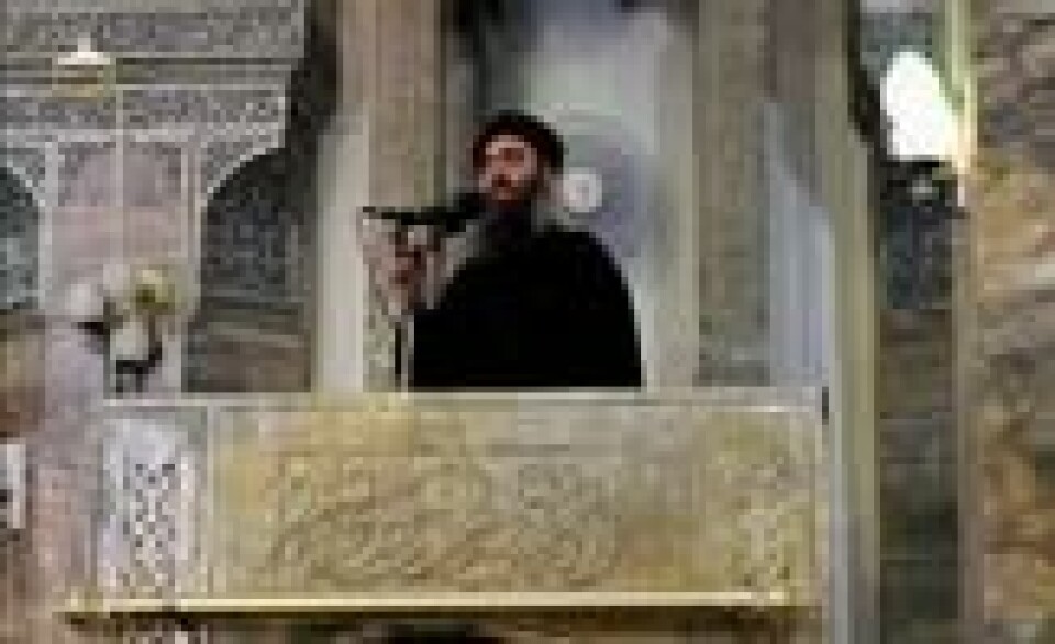 Et av de få offentlig tilgjengelige bildene av IS' «åndelige overhode», Abu Bakr al-Baghdadi. Fra talen i moskeen i Vest-Mosul 4. juli 2014. Et av de få offentlig tilgjengelige bildene av IS' «åndelige overhode», Abu Bakr al-Baghdadi. Fra talen i moskeen i Vest-Mosul 4. juli 2014. Foto: Reuters Tv / Reuters