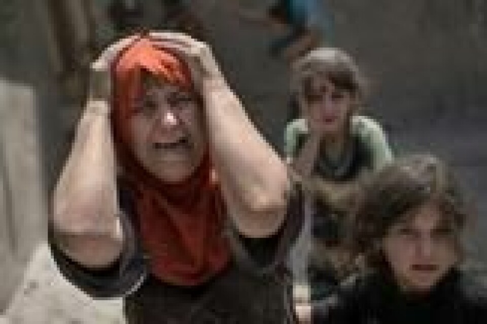 En familie på flukt i Mosul under kampene mellom irakiske spesialstyrker og IS-militante i juli 2017. Scanpix/AP. En familie på flukt i Mosul under kampene mellom irakiske spesialstyrker og IS-militante i juli 2017. Scanpix/AP.