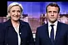 PRESIDENT: Marine Le Pen (t.v.) tilhører Nasjonal front, mens Emmanuel Macron har startet sin egen bevegelse 'En Marche!' (Fremad!) etter å ha vært næringsminister i sosialistregjeringen. Søndag blir en av dem Frankrikes nye president. Foto: Eric Feferberg / AP / NTB scanpix