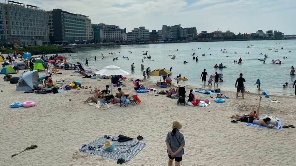 Den sørkoreanske øya, Jeju, er en populær destinasjon for både turister og koreanere. Bildet er tatt på Hamdeok strand på Jeju.