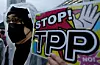 Fra en demonstrasjon mot TPP-avtalen i Tokyo 22. april 2014. Scanpix/AP.