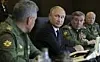 Russlands president Vladimir Putin, forsvarsminister Sergei Shoigu og forsvarssjef Valery Gerasimov styrer krigen mot nabolandet Ukraina. Foto: Michael Klimentyev / Reuters
