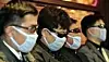 Avhoppere fra nordkoreanske spesialstyrker under en pressekonferanse i Sør-Korea i 2005. Solbriller og ansiktsmasker for å skjule deres identitet. Scanpix/AP.