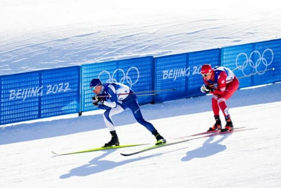 Iivo Niskanen fra Finland og Aleksander Bolsjunov fra Russland under 15 km x 15 km Skiathlon for menn under vinter-OL i Beijing 2022. Iivo Niskanen fra Finland og Aleksander Bolsjunov fra Russland under 15 km x 15 km Skiathlon for menn under vinter-OL i Beijing 2022. Foto: Fredrik Varfjell / NTB Foto: Fredrik Varfjell / NTB
