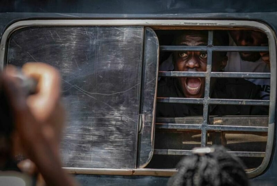 En demonstrant skriker etter å bli arrestert av militærpolitiet under en protest mot korrupsjon i Kampala, Uganda, 23. juli. En demonstrant skriker etter å bli arrestert av militærpolitiet under en protest mot korrupsjon i Kampala, Uganda, 23. juli. Foto: Foto: Hajarah Nalwadda / AP / NTB