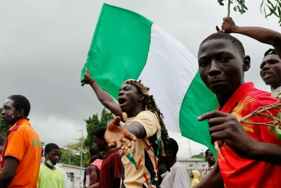 Unge demonstranter protesterer mot regjeringen i Abuja, Nigeria, 2. august. Unge demonstranter protesterer mot regjeringen i Abuja, Nigeria, 2. august. Foto: Foto: Shutterstock Editorial / NTB