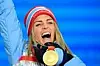 Therese Johaug jubler etter å ha vunnet OL-gull. Foto: Tobias Schwarz / AFP