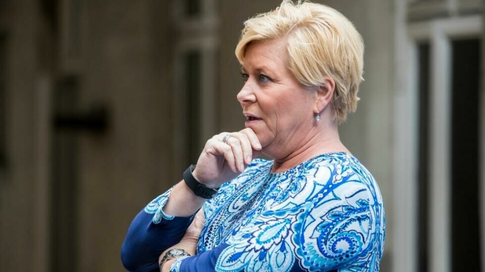Partileder Siv Jensen i Frp oppsummerer det politiske halvåret på en pressekonferanse i Oslo fredag.