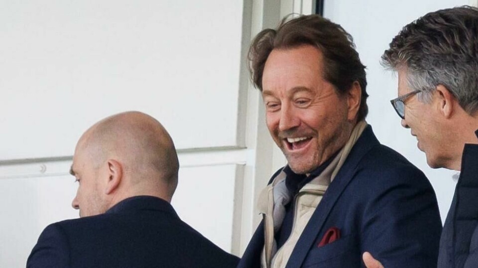 Kjell Inge Røkke (nr to fra høyre bakerst) smiler etter eliteseriekampen i fotball mellom Molde og Bodø/Glimt på Aker Stadion.