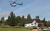 MANNSKAPER: Et helikopter og flere væpnede politipatruljer rykket ut til Feiring i Eidsvoll. Foto: Lise Åserud / NTB scanpix