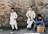 Afghanske barn med leketøysvåpen under den musliske høytiden Eid al-Fitr. Kabul 24. mai. NTB Scanpix/Reuters.