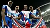 Her feirer britene OL-gull etter stafetten i 2004. Fra venstre ser man Marlon Devonish, Jason Gardener, Mark Lewis-Francis og Darren Campbell. Foto: Dylan Martinez / Reuters/NTB